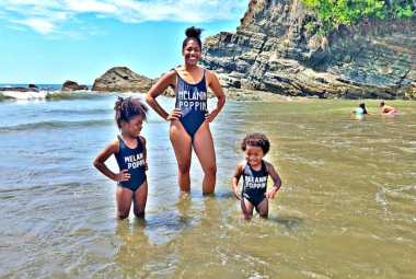 Mother and children on the beach